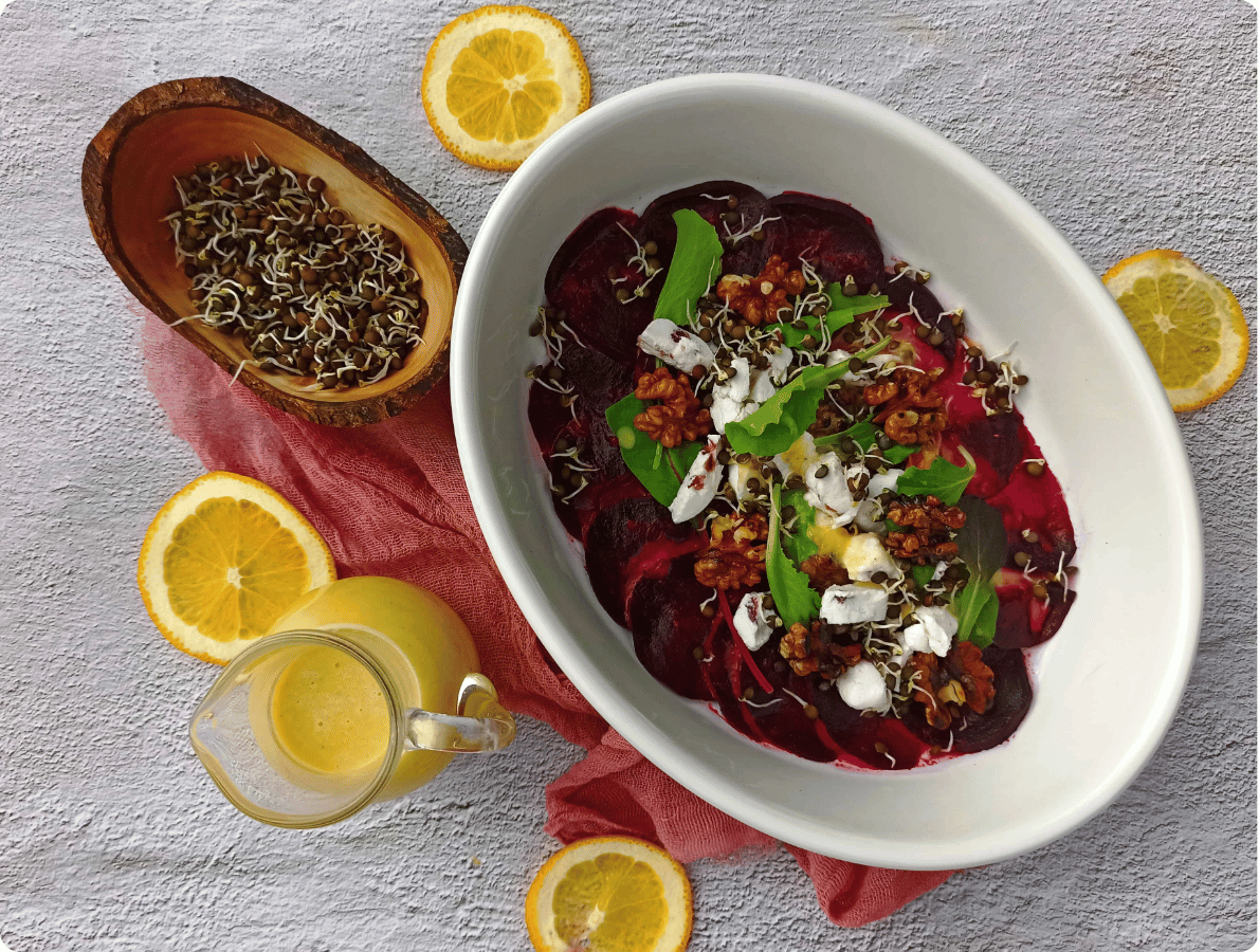 Carpaccio z červené řepy s pomerančovou zálivkou .
